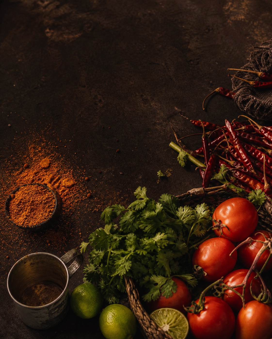 Editorial still life of market produce, spices and utensils